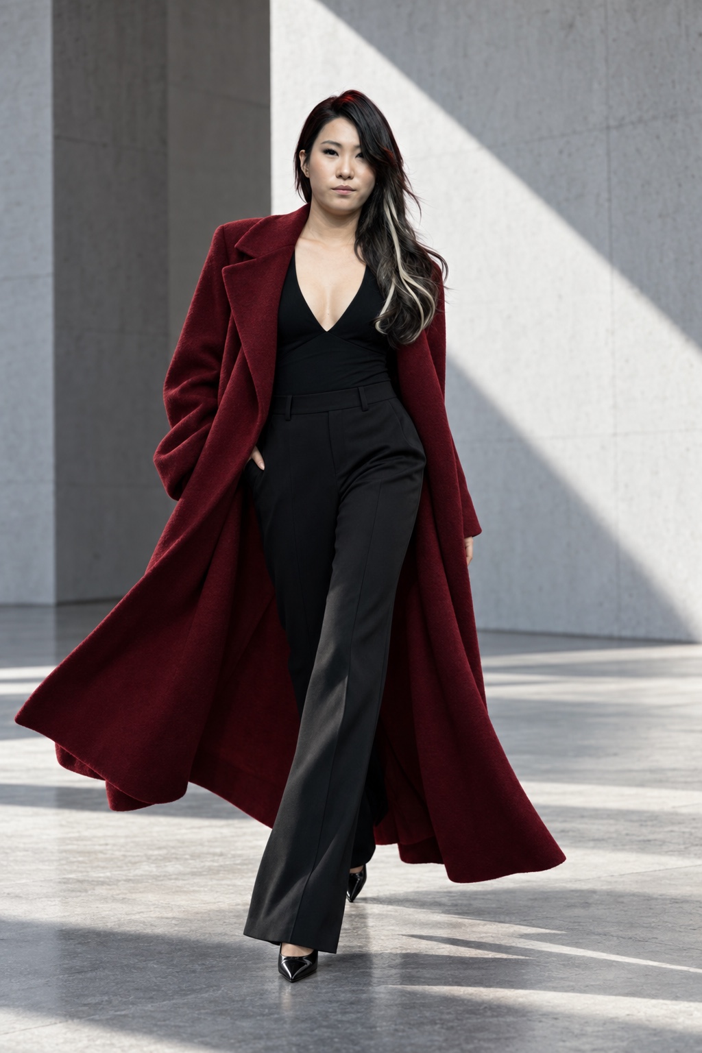 Enyu walking through an architectural gallery in a burgundy coat, AI-assisted fashion editorial